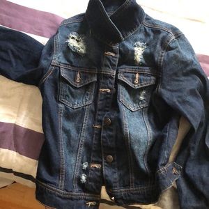 A nice jean jacket with two packets
